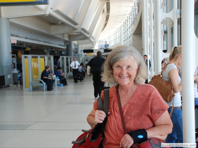 July 25: Nancy smiling, Newark airport