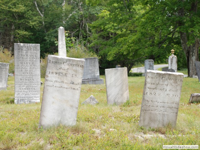 July 31:  After lunch, we bicycled from Nervous Nellie's.  Nancy, Bob and I all rode 23 miles.  Along the way, I stopped at an old cemetary.  Here are the resting places of folks who died in the 1820s.