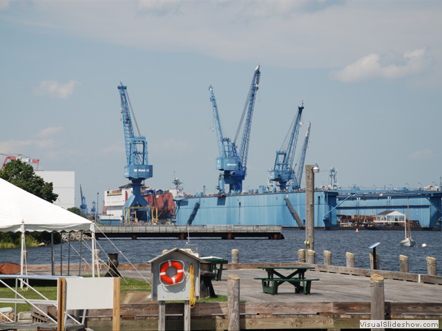August 3:  Bath Iron Works, where a naval destroyer is under contruction.  you can see its mast to the right of the leftmost blue crane.