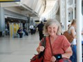 July 25: Nancy smiling, Newark airport