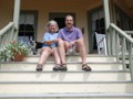 July 28:  Nancy and Pete on the cottage steps, just before driving back to Portland for the next phase of our adventure.
