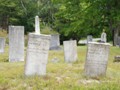 July 31:  After lunch, we bicycled from Nervous Nellie's.  Nancy, Bob and I all rode 23 miles.  Along the way, I stopped at an old cemetary.  Here are the resting places of folks who died in the 1820s.